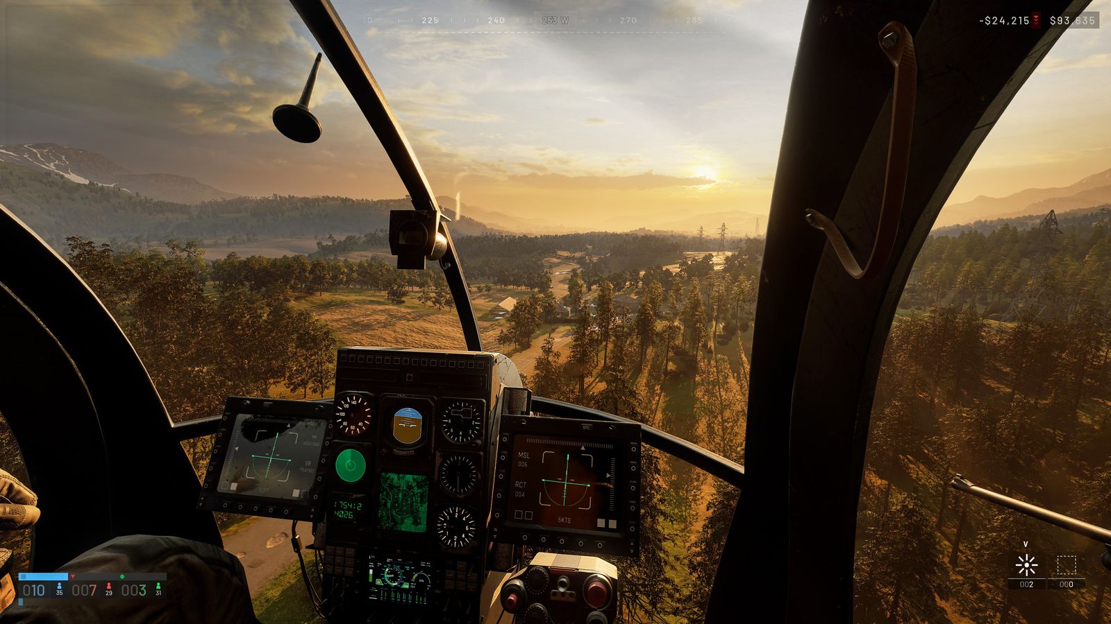 Cockpit view from a WARDOGS helicopter at sunrise, instrument panel visible, flying over forest toward distant hills